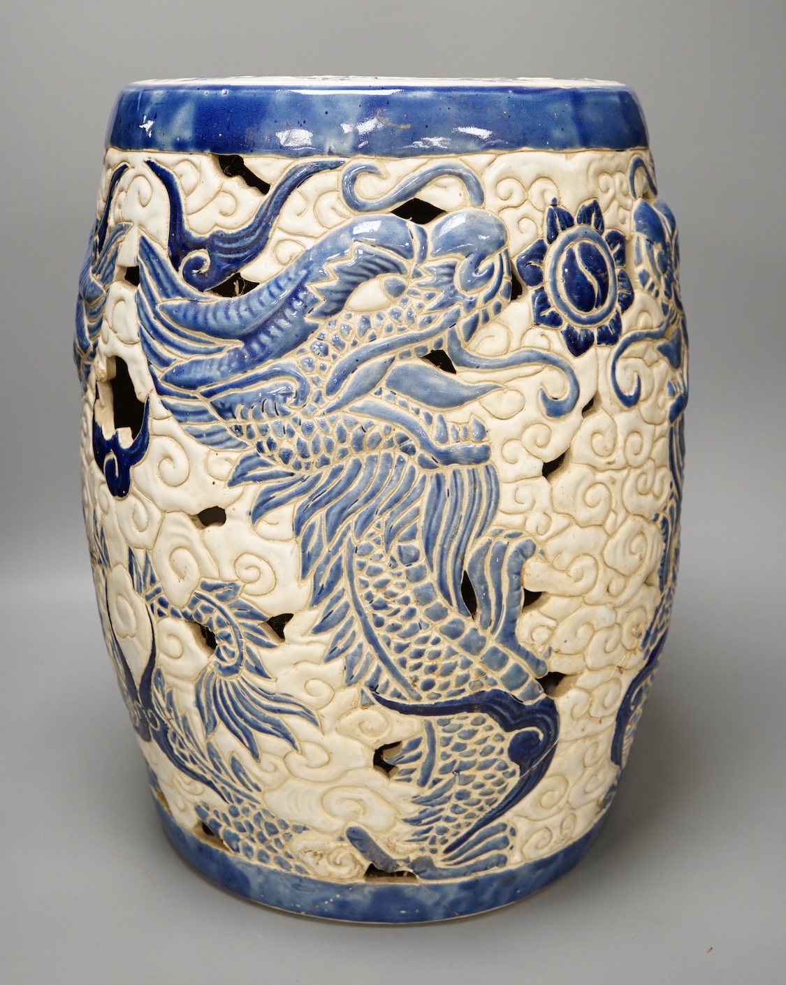 A pierced Chinese stoneware garden seat 42cm